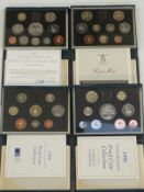 Royal Mint deluxe cased brilliant uncirculated coin sets comprising 1989, 1994, 1996 and 1997,