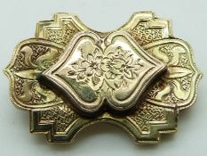 Victorian brooch with engraved decoration