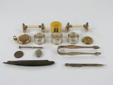 Three hallmarked silver napkin rings and pair of Georgian hallmarked silver bright cut sugar tongs