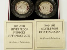 A cased pair of silver proof Piedfort 50 pence coins, 1992 and 1993