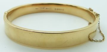 A hallmarked 15ct gold bangle, Chester 1909, 14.2g