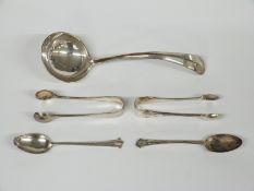 A quantity of hallmarked silver cutlery to include rat tail ladle, two pairs of sugar tongs and