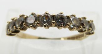 A 9ct gold ring set with cubic zirconia