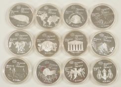 Twelve silver Canadian 10 dollar 1976 Olympic coins, weight 48.6g each