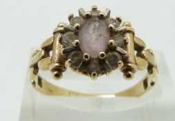 A 9ct gold ring set with quartz and cubic zirconia, size R