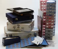 Two aluminium coin collectors' cases and trays etc