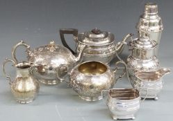 Two late 19th/20th plated tea sets, a hinged jug impressed Brook and Son, Edinburgh and a cocktail