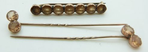 Victorian brooch set with chrysoberyl and two matching stick pins