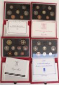 Four Royal Mint deluxe cased UK proof coin sets 1987, 1988, 1989 and 1990