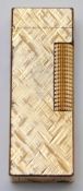 Dunhill plated cigarette lighter with chequered decoration, 6.5cm.