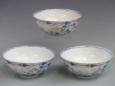 A set of three Chinese Tongzhi mark and period pedestal bowls with dragon decoration, height 7cm,