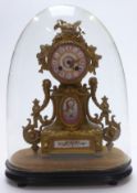 French ormolu style mantel clock with Sevres panels, the movement striking on a bell, raised on