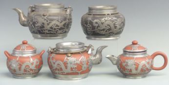 Chinese terracotta and pewter teaset, pewter teapot and matching caddy, all marked Shanghai China to