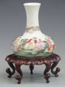 Chinese Republic Period pedestal vase decorated with figures amongst rocks and foliage, purchased by