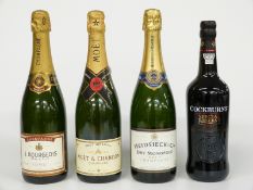 Four bottles of alcohol comprising Heidsieck & Co, Moet & Chandon and J Bourgeois 75cl bottles of