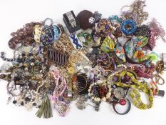 A collection of costume jewellery including necklaces, watches, brooches etc