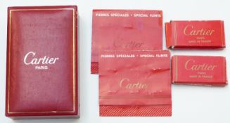 Cartier gold plated cigarette lighter with ribbed decoration, in original Cartier fitted box with