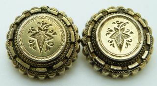 A pair of Victorian clip earrings with engraved ivy decoration