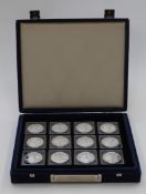 Twelve commemorative silver crown sized coins in celebration of English monarchy, the examples