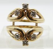 A 14k gold ring set with six diamonds, size I (the previous lot matches this ring which fits over