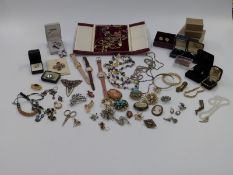 A collection of jewellery including pearl and agate necklace, shell necklace, brooches etc