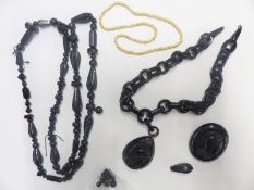 Victorian carved jet cameo brooch, similar pendant, jet necklaces etc