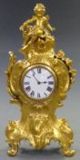 Nineteenth century gilt brass French mantel clock, the enamel Roman dial with blue spade hands,
