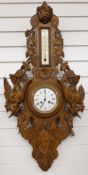 Late nineteenth / early twentieth century black forest carved wall clock / thermometer compendium.