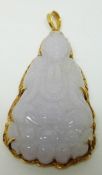 A 22ct gold pendant set with a Chinese lavender jade carved Buddha, length 5cm
