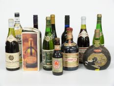 Twelve bottles of alcohol to include Drambuie 1 litre, Harvey's Bristol Cream sherry, 75cl, 17.5%