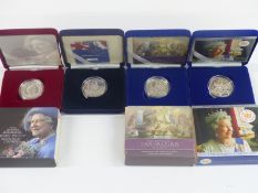 Four Royal Mint silver proof crowns comprising 2002 Golden Jubilee, 2002 Queen Elizabeth the Queen