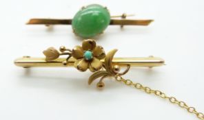 Chinese gold brooch set with a jadeite cabochon and a 9ct gold brooch set with a turquoise