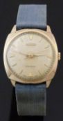 Roamer Premier 9ct gold gentleman's wristwatch with gold hands and markers, champagne face and