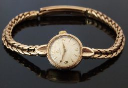 Omega 9ct gold ladies wristwatch ref. 841.610 with gold hands and markers, cream dial and signed