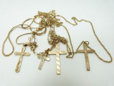 Four 9ct gold chains and four 9ct gold cross pendants, 11.8g