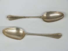 A pair of Georgian bottom hallmarked silver tablespoons, London possibly 1776 but date letter
