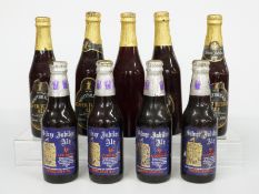 Nine bottles of Silver Jubilee ale comprising five Whitbread 33cl and four Courage 275ml