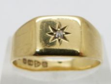 An 18ct gold ring set with a diamond, Chester 1928, 5.1g, size R