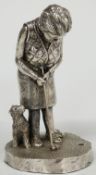 Modern hallmarked silver novelty figure modelled as a lady golfer with dog beside, Sheffield 1997