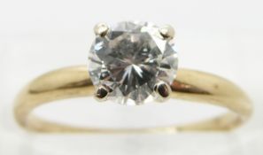 A 14k gold ring set with round brilliant cut diamond of approximately 0.8ct, size I (the following