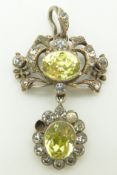 A Victorian pendant set with foiled yellow and clear paste, 4.5cm, in tooled leather box