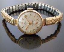Cyma Cymaflex 9ct gold cased ladies wristwatch with inset subsidiary seconds dial, gold hands and