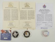 Three silver crowns comprising millennium £5 coin, 2004 Entente Cordial £5 coin and 2007