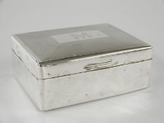 George VI hallmarked silver cigarette box with engine turned decoration to lid, Birmingham 1949