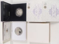 Two Royal Mint silver proof crowns, one 2011 Prince William and Catherine Middleton wedding, the