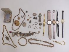 A large silver charm bracelet, silver brooch, Victorian brooch, 9ct gold and silver ring, Sekonda