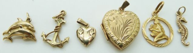 Six gold pendants including a heart locket, sea horse, anchor etc, 8.6g