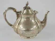 Victorian hallmarked teapot of bulbous lobed form, London 1854 maker Smith, Nicholson & Co, height