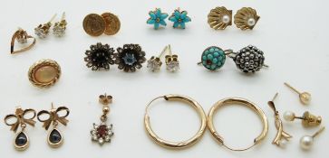A collection of earrings including yellow metal, 9ct gold set with turquoise, 9ct gold in the form