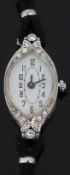 Art Deco platinum ladies cocktail wristwatch with diamond set case, black hands and Arabic numerals,